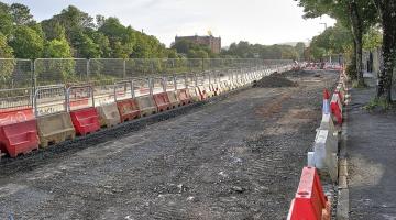 A road being resurfaced with fresh tarmac